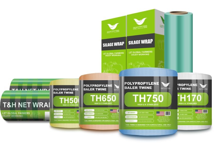 Assorted agricultural packaging products including silage wrap and baler twine in various colors.